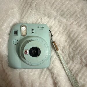 Light Blue Polaroid Camera